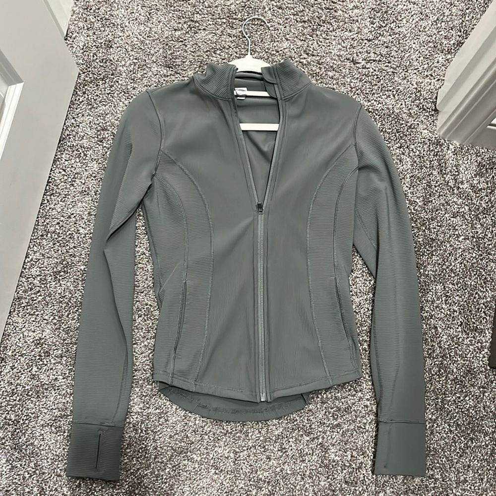 Green zip up jacket